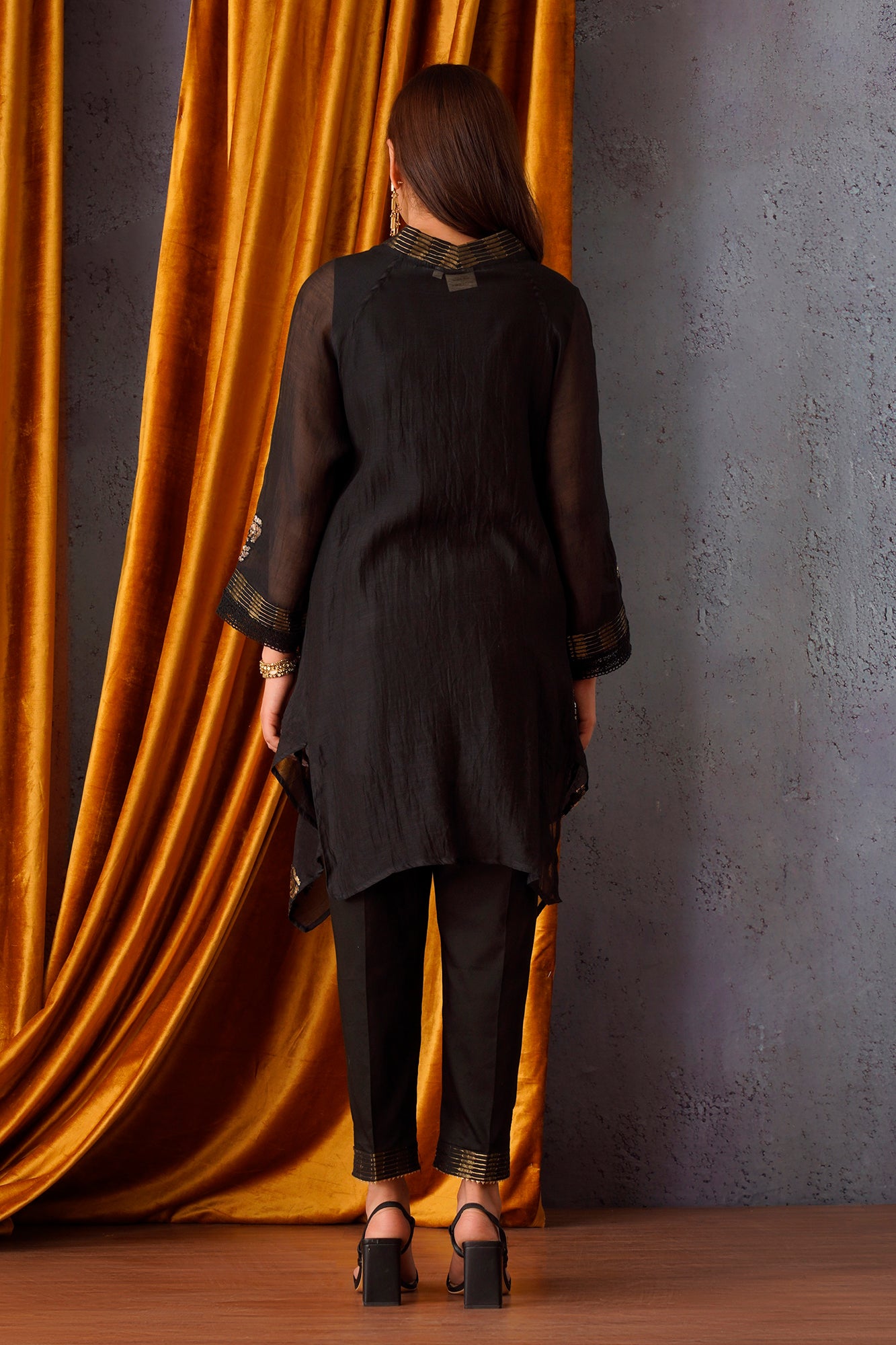 Sequin embroidered asymmetric tunic set with V-neck in Black and side stripe pants