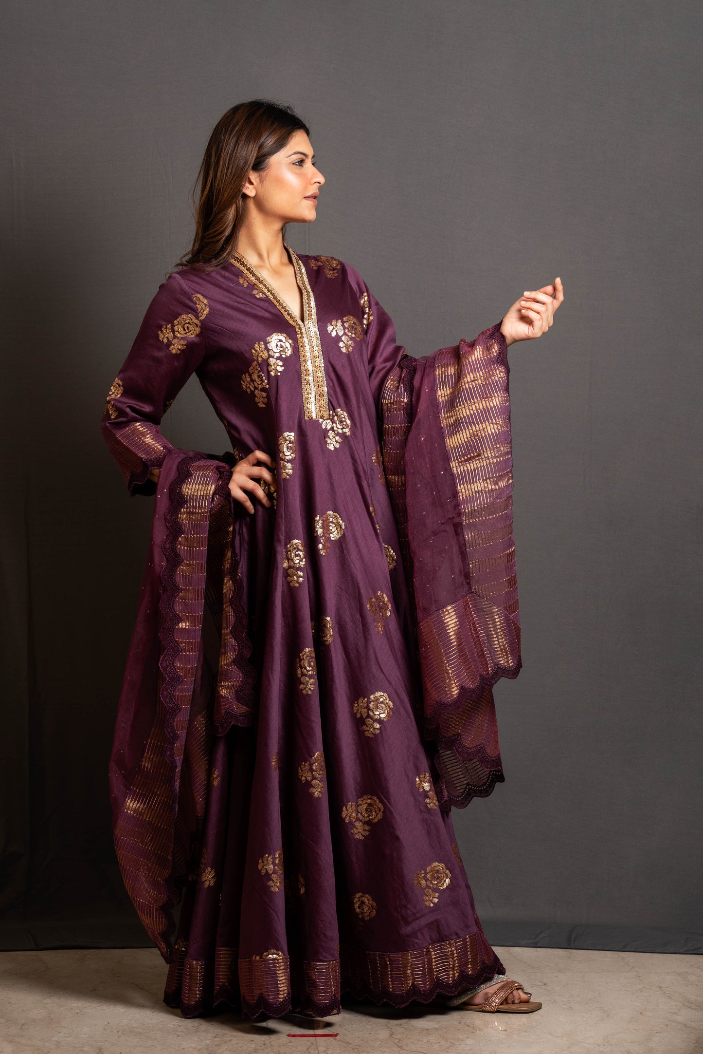 Wine sequin embroidered flared panelled kurta.