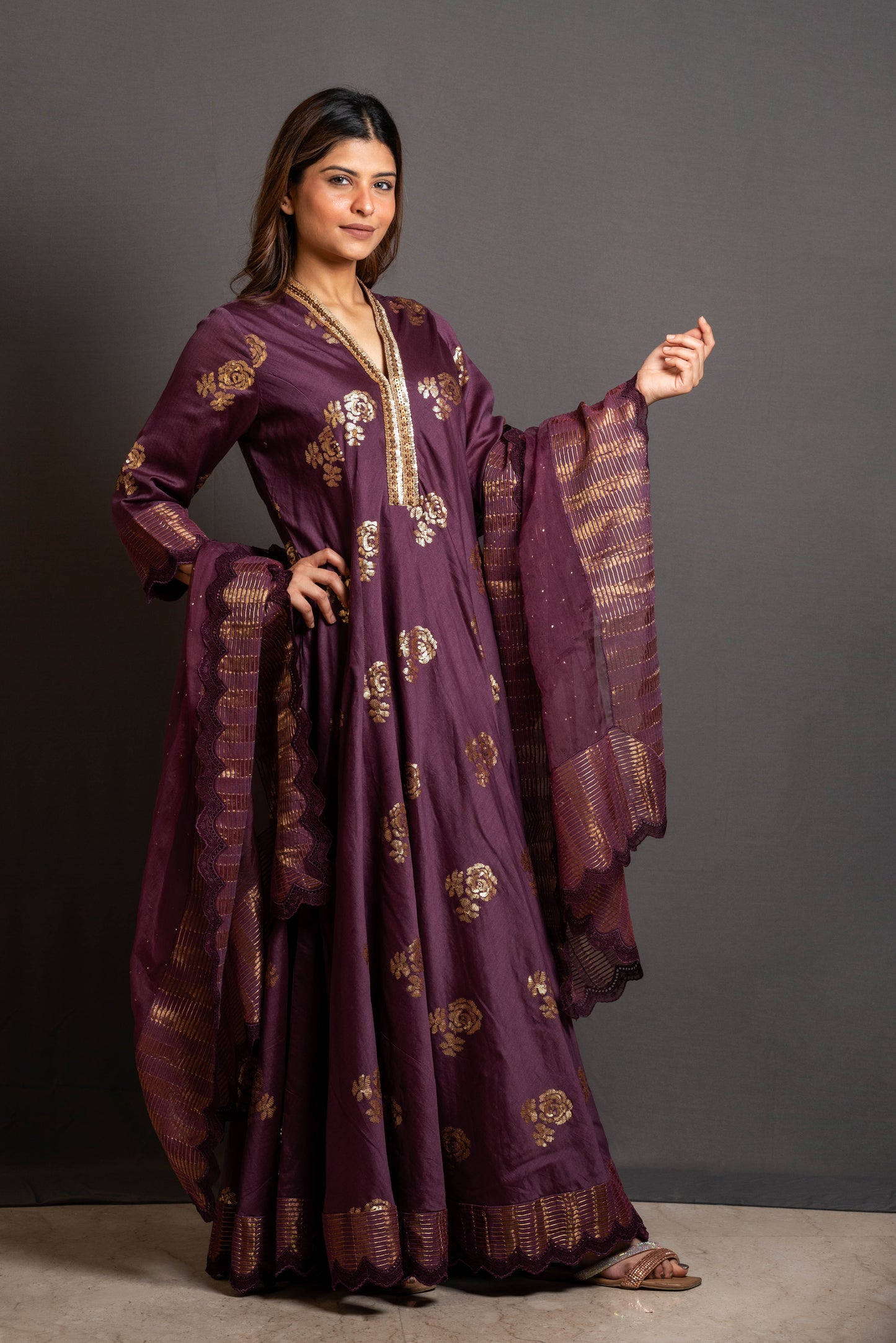 Wine sequin embroidered flared panelled kurta.