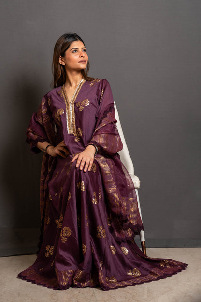 Wine sequin embroidered flared panelled kurta.