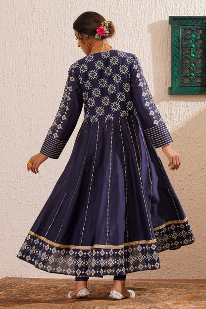 Block printed yoke and border anarkali with churidaar and organza dupatta.