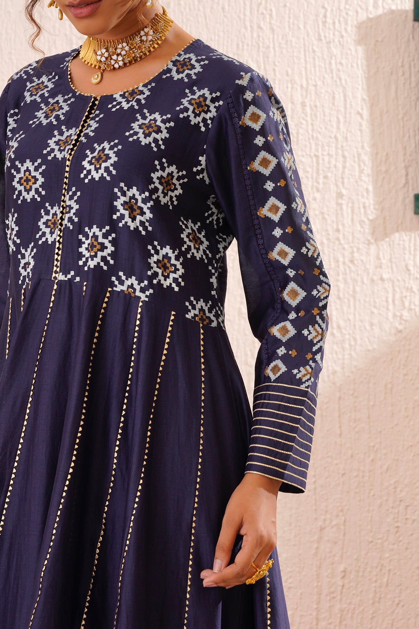 Block printed yoke and border anarkali with churidaar and organza dupatta.