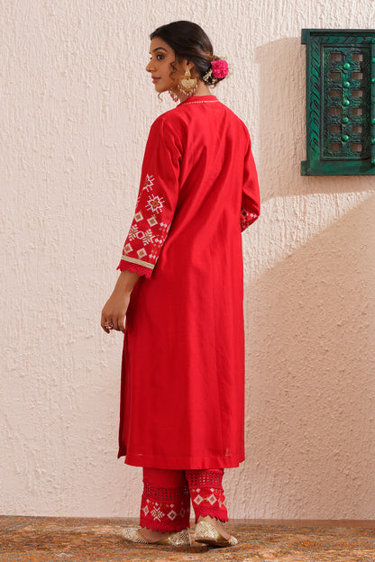 Block printed straight kurta set with lace detailing on pants and organza dupatta.