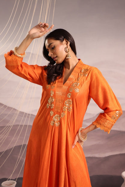 Orange sequin embroidered flared panelled kurta