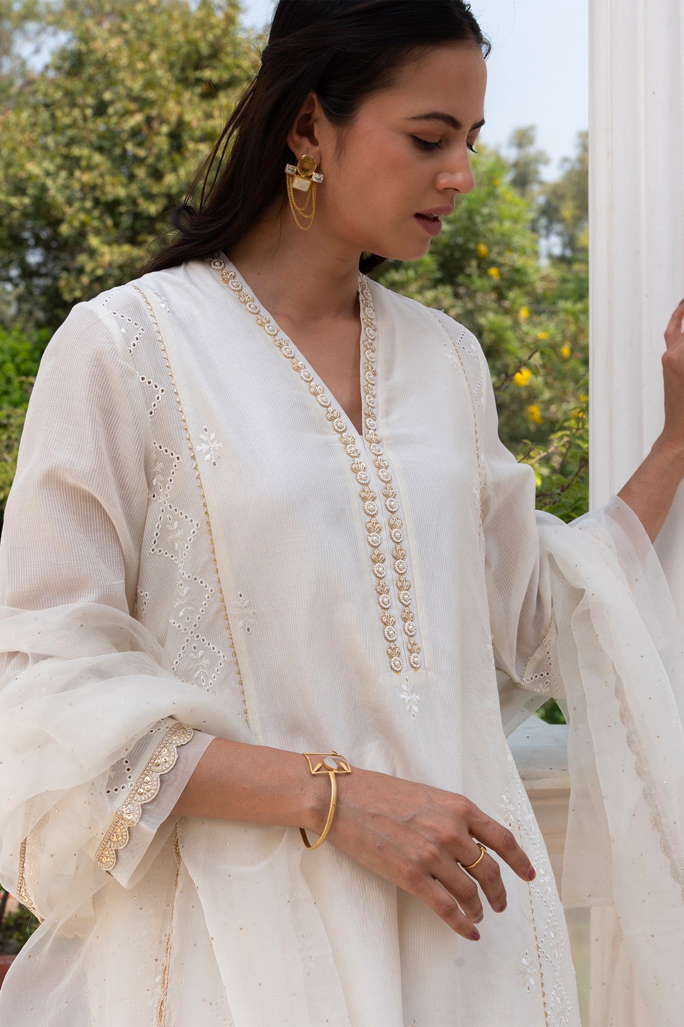 Off White Buti Embroidered Panelled Kurta Set