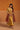 Antique gold velvet Vira kurta set with rust striped dupatta, worn by a model